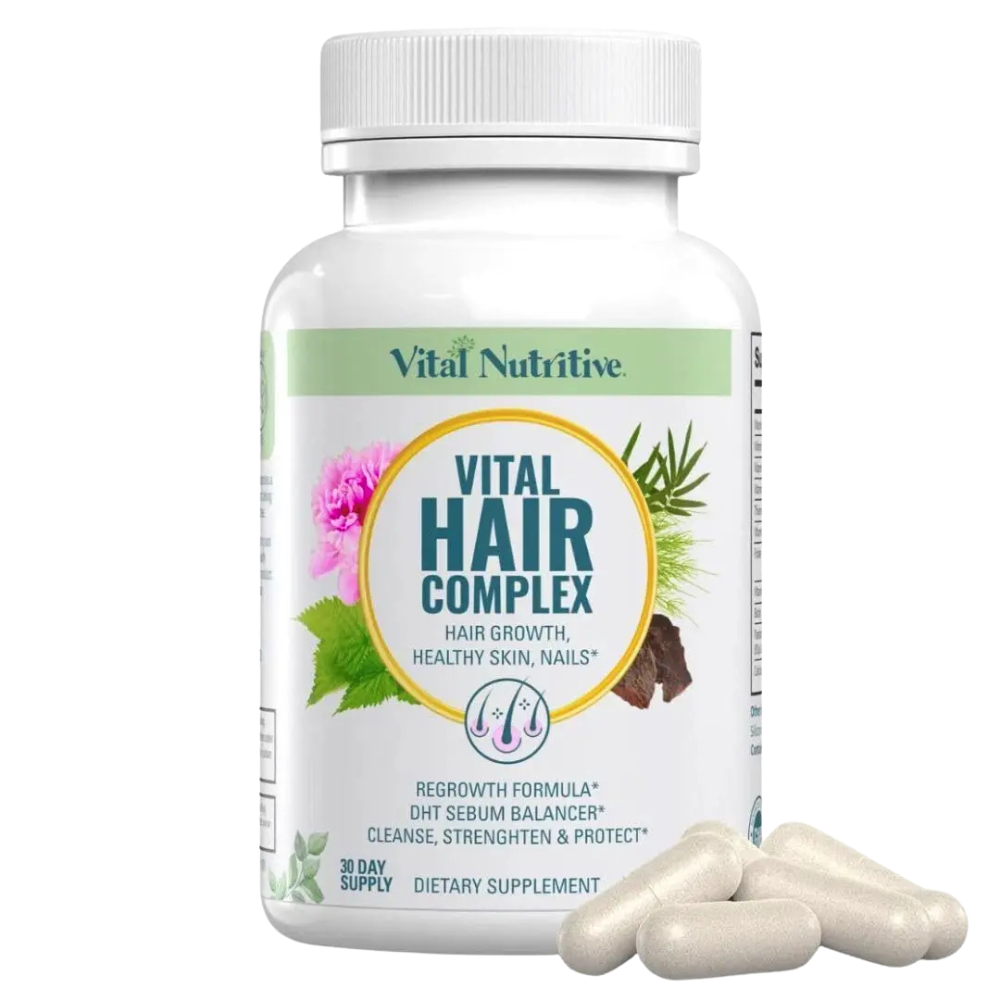 A white plastic bottle of Vital Nutritive Vital Hair Complex dietary supplement with a white cap, shown on a white background with several off-white capsules in the foreground.